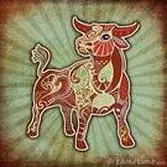 A red and green cow is on a blue background